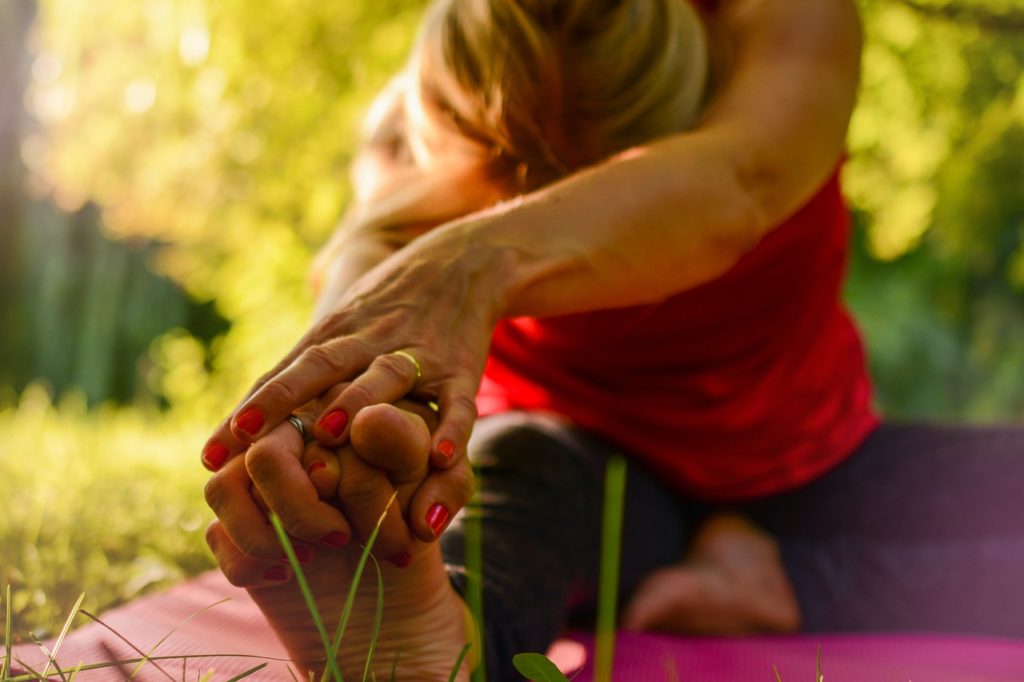 meaning when a woman stretches in front of you